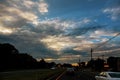 Cars in traffic at anlights on a busy highway sunset evening Royalty Free Stock Photo