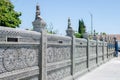 Apsara and Buddhist temple fence