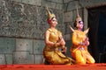 Apsara dancers kneel in the performance, Siem Reap, Cambodia