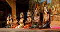 Apsara dancers kneel