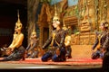 Apsara dancers kneel