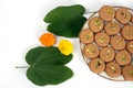 Apta leaf with Marigold flowers and sweet, a concept for Dussehara or Vijayadashami, an Indian festival