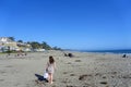 Aptos, California, United States - May 1st, 2022: People relaxing and admiring the views on Rio Del Mar beach along Monterey Bay