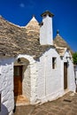 Apulia Puglia Italy. Alberobello. Trulli: traditional Apulian dry stone huts with a conical roof