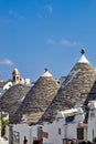 Apulia Puglia Italy. Alberobello. Trulli: traditional Apulian dry stone huts with a conical roof