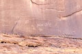 Fragment of surviving rock inscriptions left over from ancient times on a rock in the Wadi Rum desert near Aqaba city in Jordan