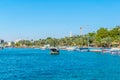 AQABA, JORDAN, DECEMBER 31, 2018: Glass-bottom boats mooring at a beach in Aqaba, Jordan