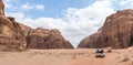 Tourists ride in open jeeps in the Wadi Rum desert Visitor near Aqaba city in Jordan