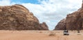 Tourists ride in open jeeps in the Wadi Rum desert Visitor near Aqaba city in Jordan