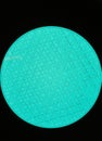 Aqua blue patterned round signal glass on black