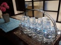 aqua glass neatly arranged on the table to entertain guests