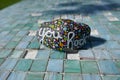 Aqua mosaic tiles and kindness rock with painted you rock message Royalty Free Stock Photo
