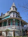 Aqua old victorian house on sunny day