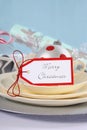 Aqua, red and white Christmas table setting. Royalty Free Stock Photo