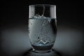 Super slow motion shot of water splashing from glass. Aqua water pouring in freshness purify concept with drops Royalty Free Stock Photo