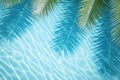 Aqua waves and coconut palm shadow on blue background. Water pool texture top view In the summer