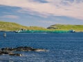 Aquaculture / fish farming at Baltasound on the island of Unst in Shetland , UK