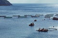 Aquaculture settlement, fish farm with floating circle cages around bay of Attica in Greece