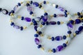 Aquamarine, agate and quartz necklace with gold beads Royalty Free Stock Photo