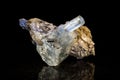 Aquamarine crystal and schorl between bedrock