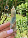 AQUAMARINE OBELISK SHAPED STONE ROCK NATURE BROWN TURQUISE BLUE LIGHT Royalty Free Stock Photo