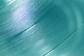 Aquamarine shiny abstract vinyl record background texture with shades of blue ice, opal blue and turquoise