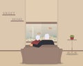 Aquarium with fish as design element for interior of room on cream background.Pair of seniors sitting hugging and look at the fish