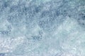 Aquatic background of sea surf waves close up with clear water and white foam Royalty Free Stock Photo