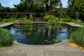 The Aquatic Garden\'s rectangular pool, showcasing floating plants at the Wave Hill Public Garden