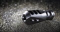 AR-15 compensator on sandblasting media Royalty Free Stock Photo