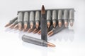 ar15 m16 m4 kalashnikov cartridges with ammo clip isolated on white Royalty Free Stock Photo