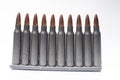 ar15 m16 m4 kalashnikov cartridges with ammo clip isolated on white Royalty Free Stock Photo