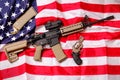 AR Rifle & Pistol on American Flag Royalty Free Stock Photo