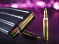 AR-15 ammo with a magazine and purple background