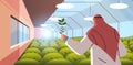 arab agricultural engineer researching plant in greenhouse agriculture scientist smart farming concept