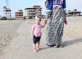 Arab baby girl with her mother going to beach Royalty Free Stock Photo