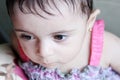 Arab baby girl thinking Royalty Free Stock Photo