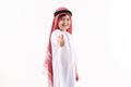 Arab boy in keffiyeh shows thumbs up. Royalty Free Stock Photo