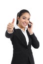 Arab business woman calling on the phone and thumb up