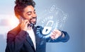 Arab businessman call on the phone, cybersecurity hologram and data protection Royalty Free Stock Photo