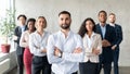 Arab Businessman Standing In Front Of Multiracial Business Team Indoor Royalty Free Stock Photo