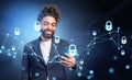 Arab businessman using smartphone, cybersecurity hologram and network circuit Royalty Free Stock Photo