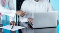 Arab Businessmen Working on a Laptop Royalty Free Stock Photo