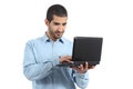 Arab casual man browsing a laptop social media