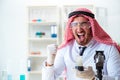 The arab chemist scientist testing quality of oil petrol Royalty Free Stock Photo