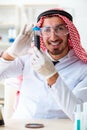 The arab chemist scientist testing quality of oil petrol Royalty Free Stock Photo