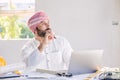 Arab construction engineer architect working at construction site with building floor plan looking out for thinking new idea Royalty Free Stock Photo