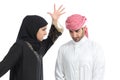 Arab couple with a woman arguing to her husband