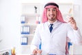 The arab dentist working on new teeth implant