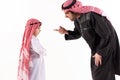 Arab dissatisfied father scolds son in ethnic